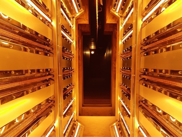 Infrared preheating chamber in operation for powder coating lines