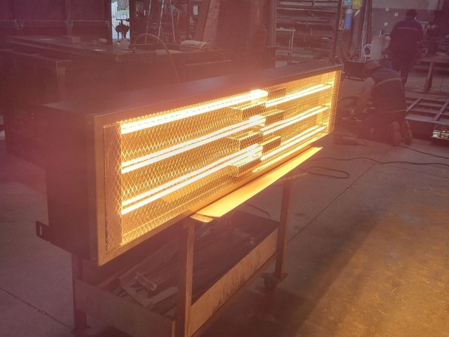 Industrial infrared heating module in operation